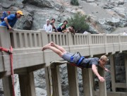 photo of person doing a superman front dive off of the bridge to nowhere bungee jump location